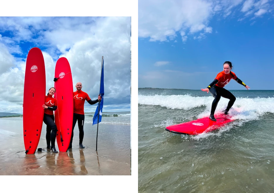 Family posing with surf boards on beach